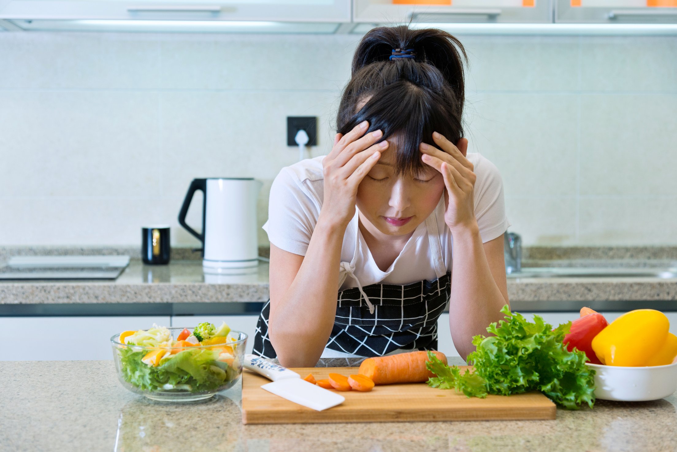 Woman tired of preparing meals